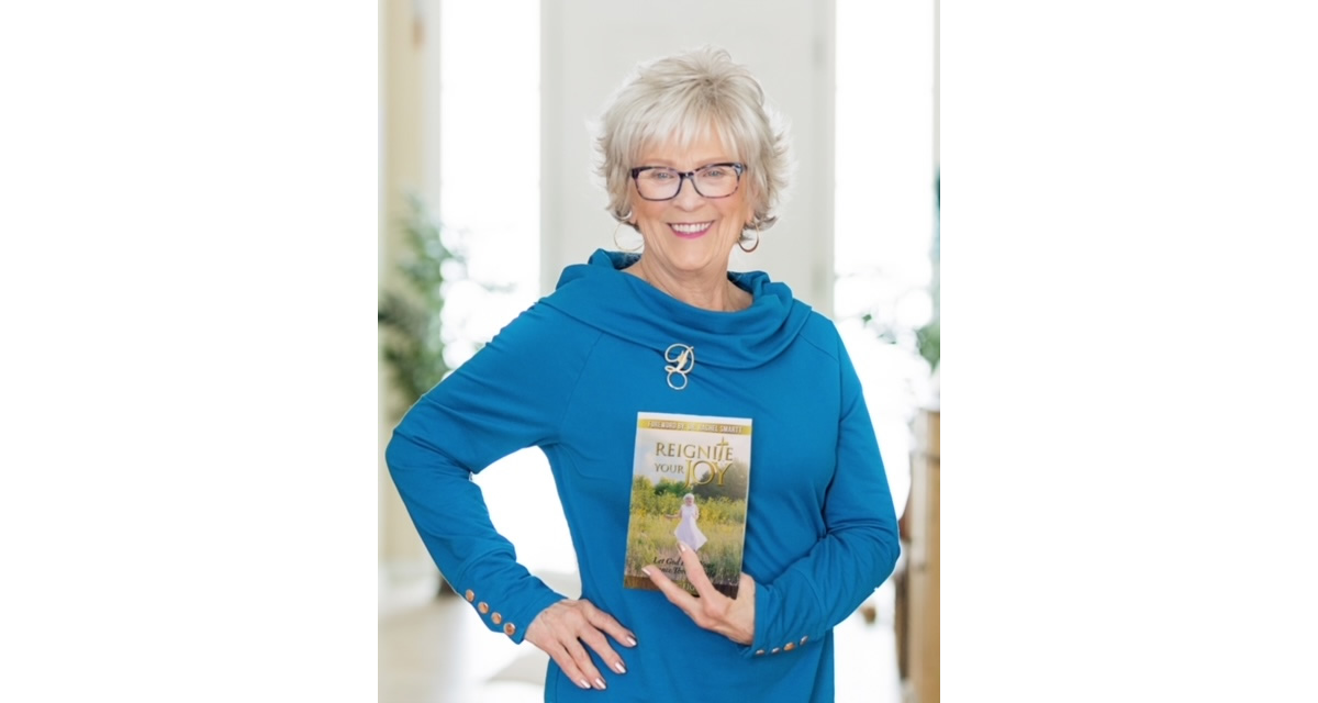 Author Dar Geiger with her new book, Reignite Your Joy